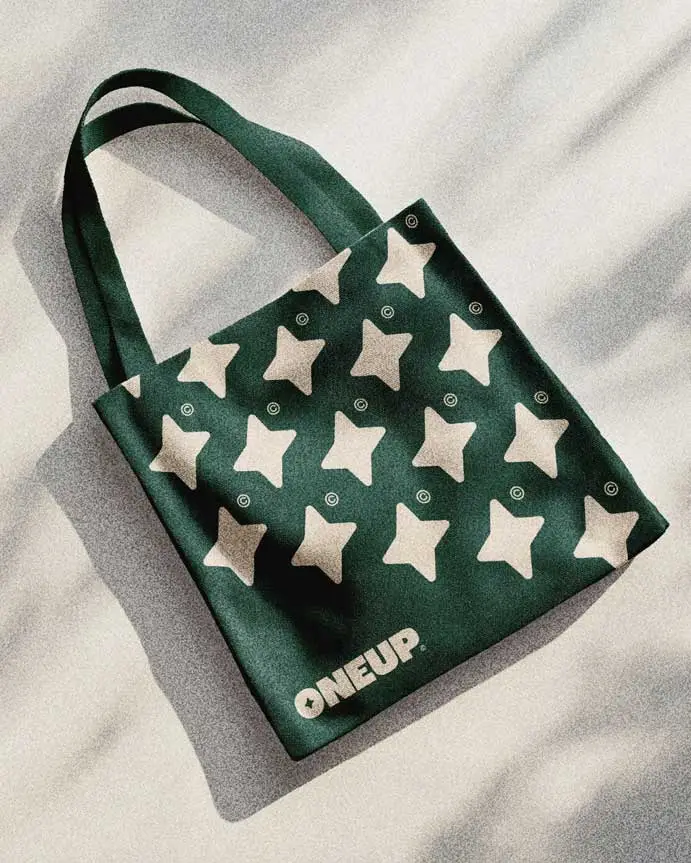 1UP canvas tote bag with ONEUP cannabis social club branding